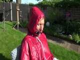 Watch Sandra bound, gagged and nylonhooded in her shiny nylon Rainwear