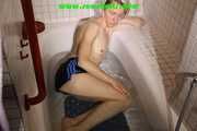 Watching sexy Sonja wearing only a sexy shiny nylon shorts taking a bath (Pics)
