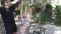  Zonah Bellum hogtied in the backyard