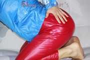 Watching sexy Sandra putting on a very special red shiny nylon pant posing and lolling for you (Pics)