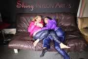 SANDRA and STELLA making fun with eachother both wearing sexy shiny nylon downwear (Pics)