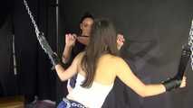 Watching Stella dominating Aiyana being tied and gagged overhead with ropes and chains (Video) Part 1 of 2