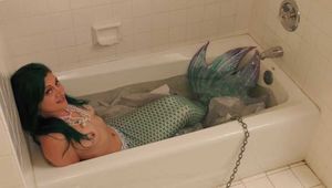 Mermaid in Captivity Flirts with Fisherman - Starring Loren Chance