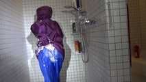 Sexy Sandra during her shaving cream action in the shower wearing a sexy blue shiny nylon rain pants and a shiny nylon purple rain jacket (Video)