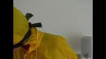 3sets of short videos with Katharina tied and gagged and hooded on a chair wearing shiny nylon rainwear (Video)