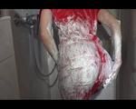 Sonja wearing a sexy red adidas shiny nylon jumpsuit while showering and messing up her clothes with shaving cream (Video)