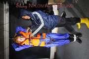 See Ronja tied and gagged by Stella in shiny nylon Rainwear and a Life Vest!