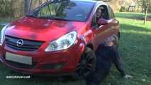 Mistress Cleo smokes and smashes balls with a car Cigarette version