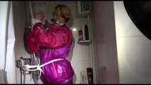 Get 2 long Archive Videos with Sonja bound and gagged in the bathroom in her shiny nylon Downwear