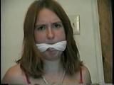 24 Yr OLD CRAFTER IS CLEAVE GAGGED, MOUTH STUFFED, HAND GAGGED, OTM GAGGED & TIED TO A CHAIR (D55-6)