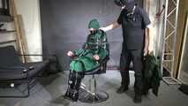 Marie M. taped and gagged in shiny nylon rainwear