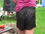 Watch Pia having fun outdoors with her shiny nylon Shorts