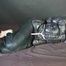 ***SEXY SONJA*** being tied and gagged on a bed with ropes and a clothgag wearing a sexy black shiny nylon down jacket and a black shiny nylon rain pants (Video)