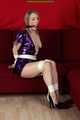 get Pictures with Sophie bound and gagged in a shiny purple wetlook Dress