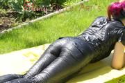 Mara sunbathing and swimming in the pool wearing a supersexy black adidas shiny nylon rainwear (Pics)