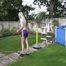 Get a video with Chloe enjoying gardening in her shiny nylon Shorts