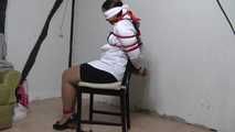 Jasmin roped to chair 2/2