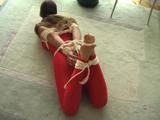 Kathi tied up in red lycra