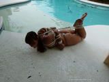 Poolside Hogtie in sunny Florida