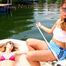 Stella ties and gagges Leonie on a boat both wearing sexy shiny nylon shorts and a bikini top (Pics)