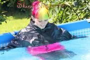 Mara wearing a supersexy 3/4 adidas pants and a supershiny pink/black rain jacket while sun bathing and go swimming in the pool (Pics)