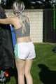 Watch Chloe enjoying her shiny nylon Shorts outside at a sunny Day