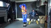 RONJA being tied, gagged and hooded hanging with ropes and a ballgag from Stella both wearing sexy shiny nylon rainwear and Ronja a lifevest (Video)