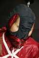 Watch Sandra bound gagged and Pantyhooded wearing her shiny nylon Rainwear