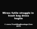 [From archive] Miras tied up in trash bag dress. Video