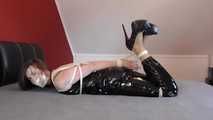 Miss J get hogtied gagged in a shiny PVC outfit